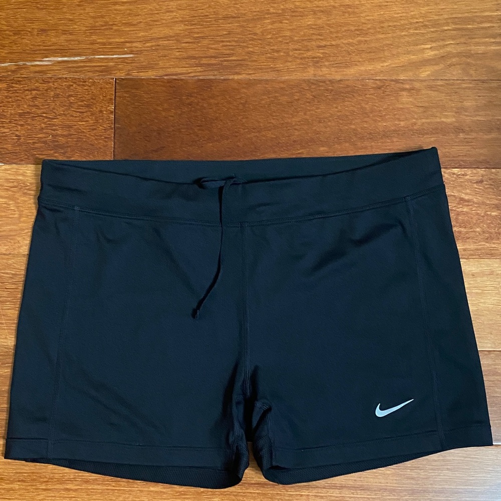Nike Women's Black Athletic Shorts with Silver Swoosh